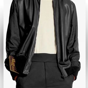 1A5VFU
Reversible Leather Nylon Jacket Size 48
Louis Vuitton